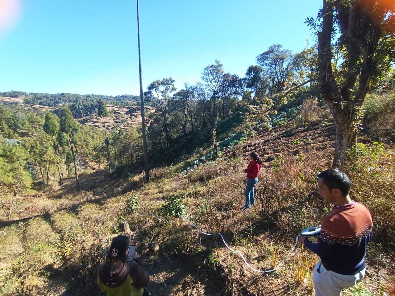 The CMU team, along with Bah R. Mawdong Rangslang, Junior Engineer (JE), Water Resources Department